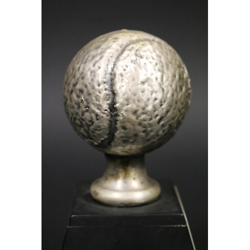 1173 - Tennis ball tennis trophy. Inscribed Aetna World Cup 1975 Ken Rosewall. Approx 15cm H including stan... 