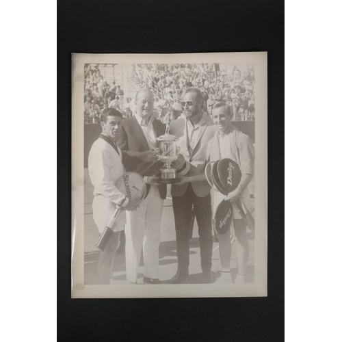 1185 - Black and white photograph of John Wayne and Charletson Heston presenting trophy to Ken Rosewall and... 