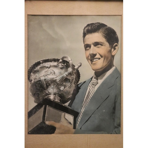 1226 - Framed photograph of Ken with the Australian Open trophy. Approx 24cm x 18cm. Provenance: Ken Rosewa... 