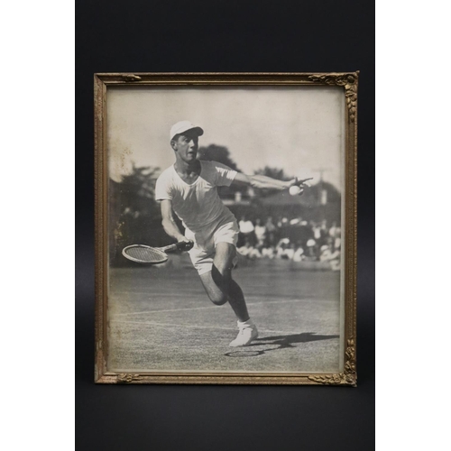 1227 - Framed black & white photograph of a young Ken playing tennis in 1950. Approx 30cm x 25cm. Provenanc... 