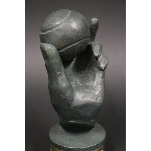 1322 - Award. LAURENCE BRODERICK (B.1935), British. Hand & tennis ball, signed verso. Plaque reads ITF 2008... 