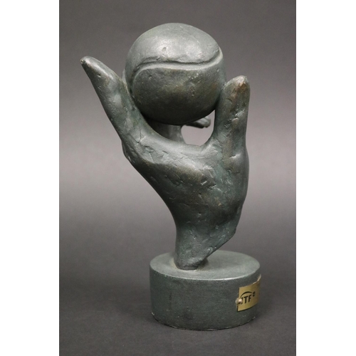 1322 - Award. LAURENCE BRODERICK (B.1935), British. Hand & tennis ball, signed verso. Plaque reads ITF 2008... 