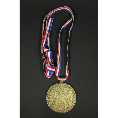 1292 - Tennis trophy medal. GRAND MASTERS 1986 HYATT REGENCY MAUI. Inscribed B.Vienna MAUI SS. Approx 7.5cm... 