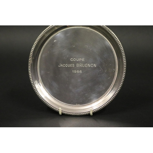 1127 - Tennis trophy plate. Inscribed COUPE JACQUES BRUGNON 1986. Approx 18cm Dia. Provenance: Ken Rosewall... 