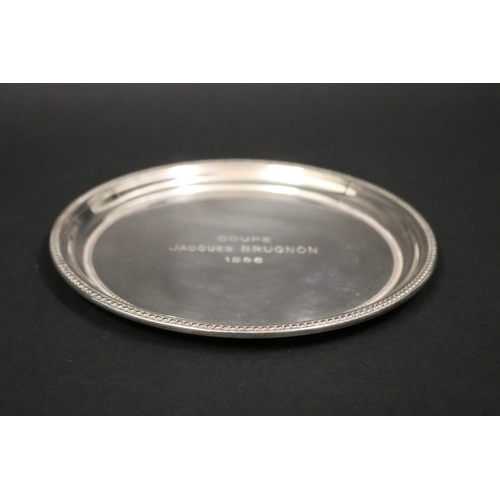 1127 - Tennis trophy plate. Inscribed COUPE JACQUES BRUGNON 1986. Approx 18cm Dia. Provenance: Ken Rosewall... 