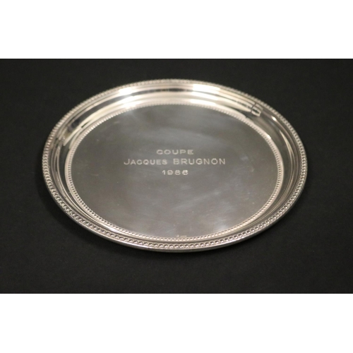 1127 - Tennis trophy plate. Inscribed COUPE JACQUES BRUGNON 1986. Approx 18cm Dia. Provenance: Ken Rosewall... 