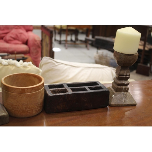 263 - Decorative wooden items to include two candlesticks, bowl and tray, approx 24cm H including candle a... 