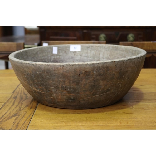62 - Primitive wooden bowl, approx 14cm H x 41cm D