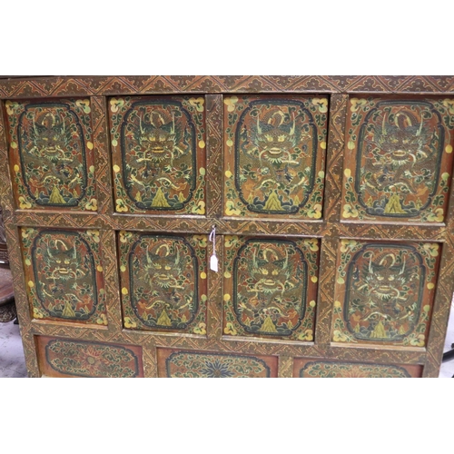 98 - Large oriental painted cabinet with dragon panels with doors, approx 122cm H x 133cm W x 50cm D