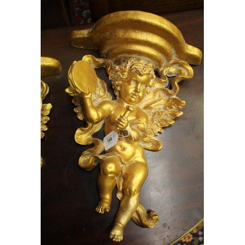 196 - Pair of decorative gilt cherub wall mounts, repairs to one, AF to other, each approx 41cm H x 30cm W... 