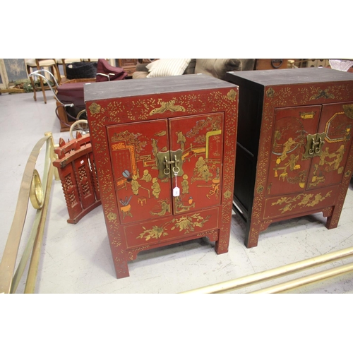 115 - Pair of oriental red lacquer cabinets with scenes, approx 90cm H x 62cm W x 40cm D