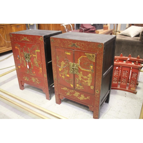 115 - Pair of oriental red lacquer cabinets with scenes, approx 90cm H x 62cm W x 40cm D