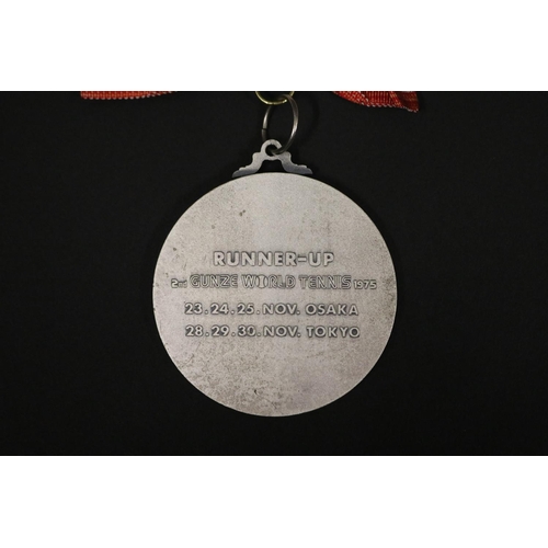 1319 - Tennis trophy medal. Inscribed, GUNZE WORLD TENNIS. RUNNER-UP 2ND GUNZE WORLD TENNIS 1975 23.24.25 N... 