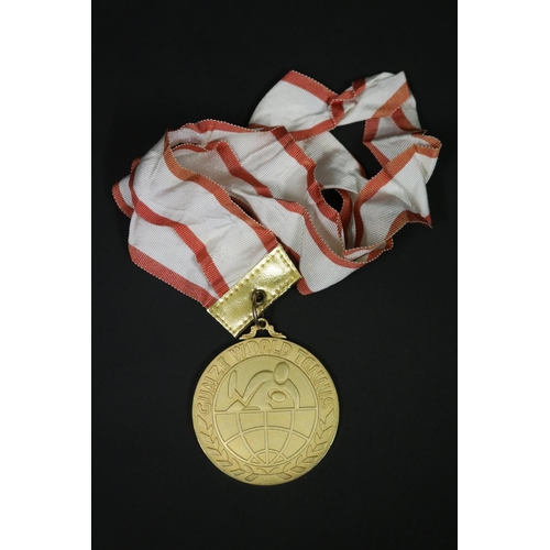 1321 - Tennis trophy medal. Inscribed, GUNZE WORLD TENNIS. WINNER 3RD GUNZE WORLD TENNIS 1976 21.23.24.NOV ... 