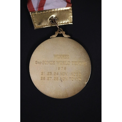 1321 - Tennis trophy medal. Inscribed, GUNZE WORLD TENNIS. WINNER 3RD GUNZE WORLD TENNIS 1976 21.23.24.NOV ... 