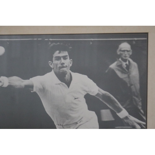1337 - Framed photograph of Ken in action. Approx 69cm x 90cm. Provenance: Ken Rosewall Collection