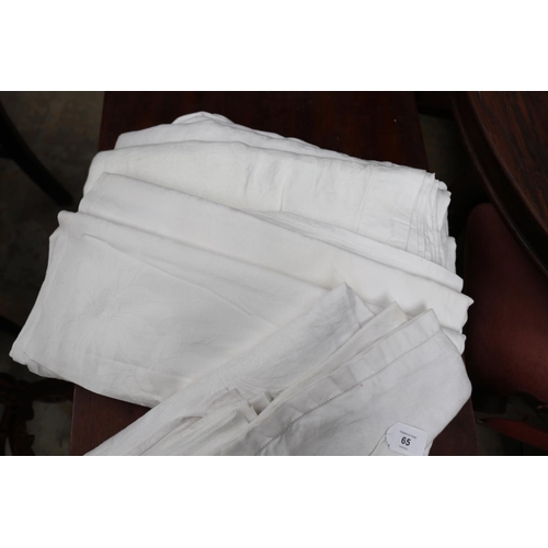 65 - Assortment of damask table cloths and similar napkins, sorry no measurements for this lot