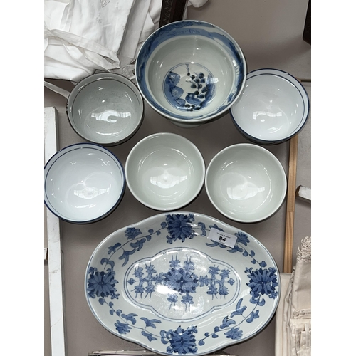100 - Scalloped edge dish along with a libation style stem cup along with five rice bowls, approx 11cm and... 