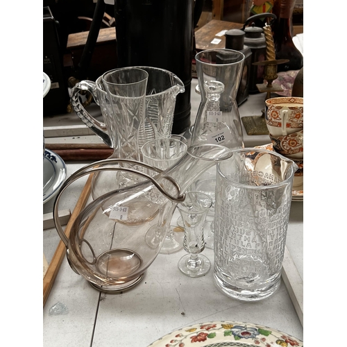 118 - Assortment of glassware. wine carafe, with metal frame, cut crystal jug, approx 26 cm H and smaller.