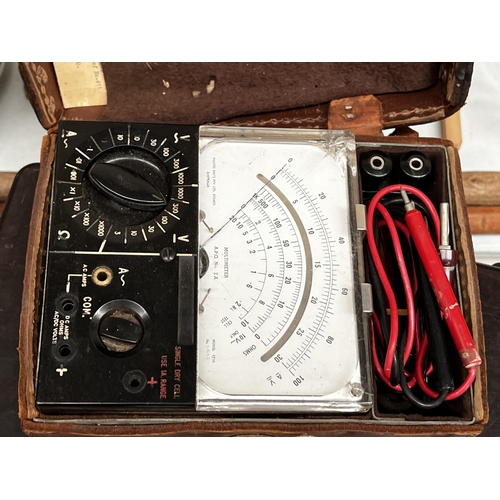 131 - Vintage Multimeter in leather case, approx 9cm H x 22cm W x 15cm D