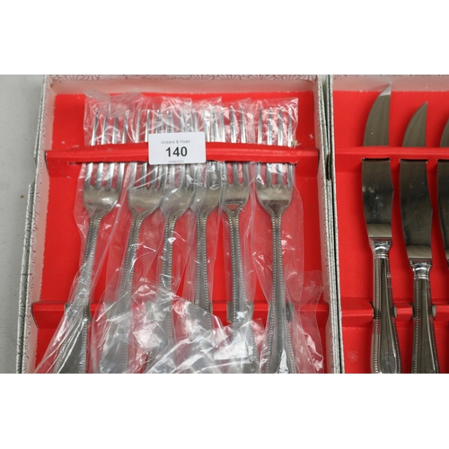140 - Silver plate knives and forks for six