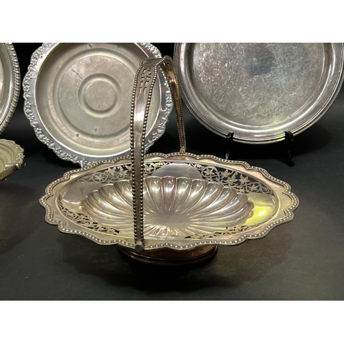 192 - Assortment of silver plate baskets and trays etc, approx 31cm Dia and smaller