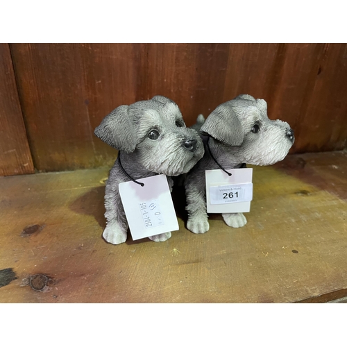 284 - Two decorative composite dogs (2) approx 14 cm H