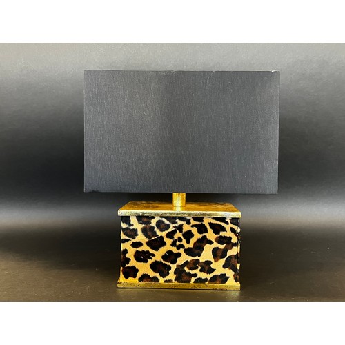 380 - Modern leopard print based lamp, approx 35cm H x 31cm W
