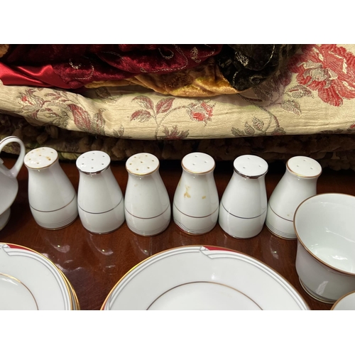 391 - Extensive Noritake Equator pattern service. approx 25 cm H smaller