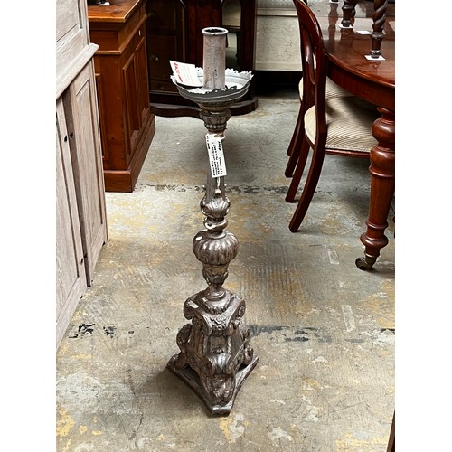 398 - Silver finished Pricket form candle holder, approx 99cm H