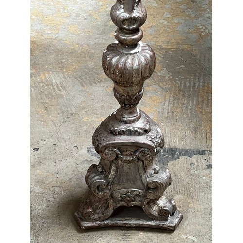 398 - Silver finished Pricket form candle holder, approx 99cm H