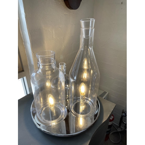 411 - New modern design chromed metal based glass bottle lamp, approx 49cm H x 40cm Dia