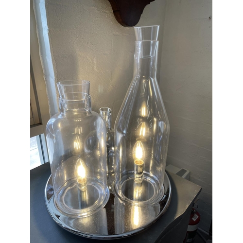 411 - New modern design chromed metal based glass bottle lamp, approx 49cm H x 40cm Dia