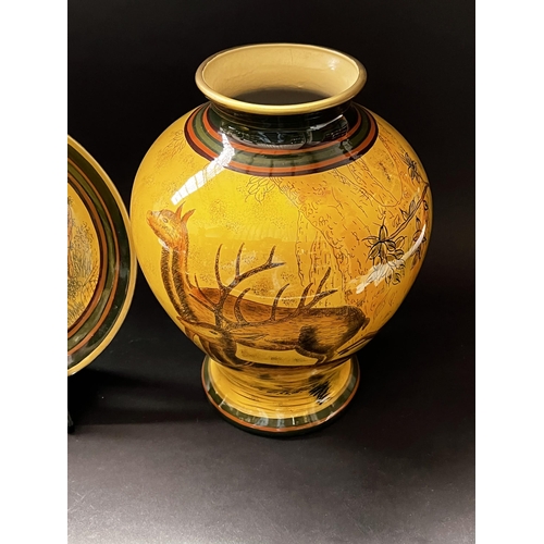 422 - Five piece decorative vase, pot, bowl and plates, approx 33cm and shorter, decorated with deer in la... 