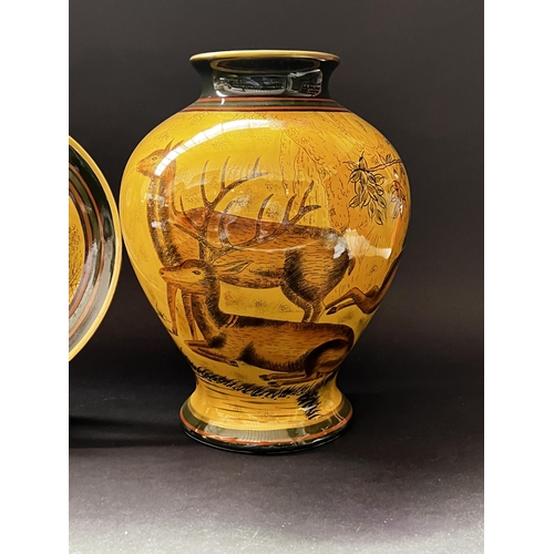 422 - Five piece decorative vase, pot, bowl and plates, approx 33cm and shorter, decorated with deer in la... 