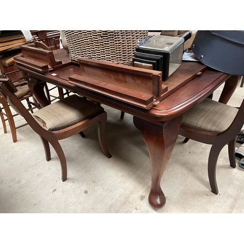 430 - Generous size Cabroile leg table, with two extra leaves, approx 77cm H x 146cm W (size without exten... 