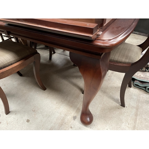 430 - Generous size Cabroile leg table, with two extra leaves, approx 77cm H x 146cm W (size without exten... 