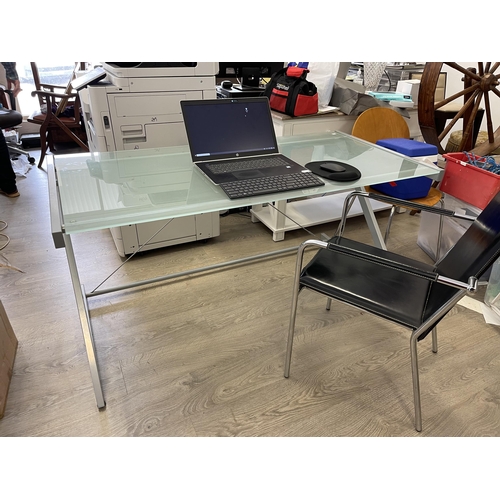 496 - Modern frosted glass topped desk and an stiched black leather chrome frame office arm chair, desk ap... 