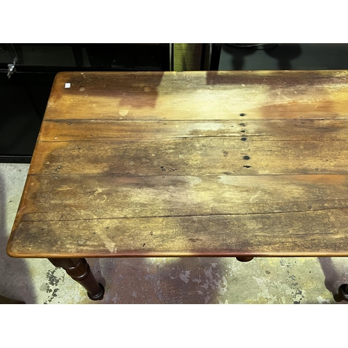 499 - Antique Australian cedar and pine turned leg kitchen table, fitted with a single drawer, approx 75cm... 