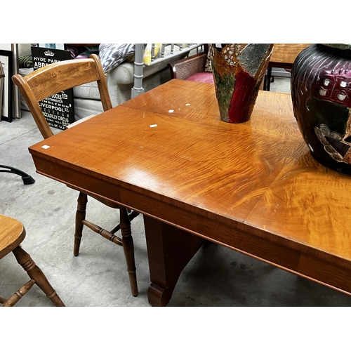 530 - Satin wood veneer Art deco twin pedestalled dining table.