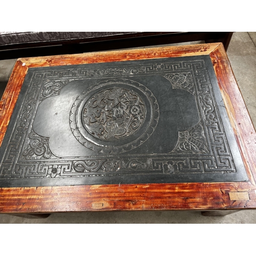 545 - Large thick leg support Chinese low table with inset carved stone top, approx 48.5cm H x 127cm L x 9... 
