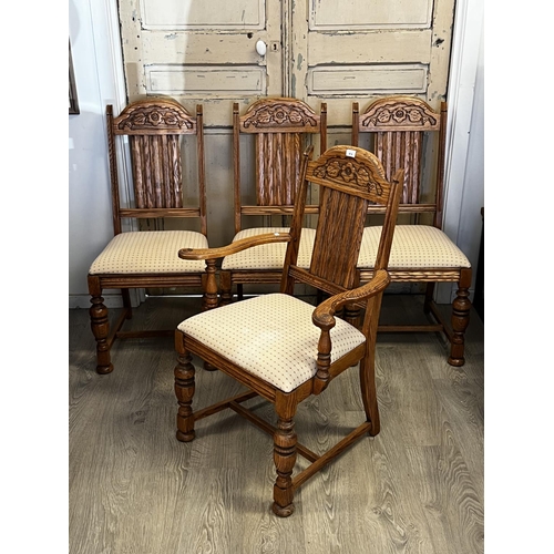 551 - Set of four American Oak turned leg dining chairs, to include one with arms  each with carved decora... 