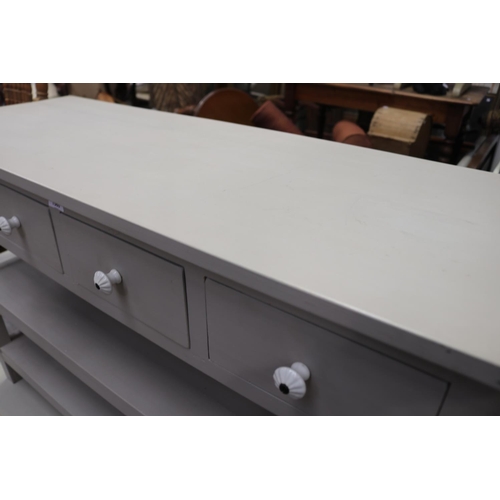 571 - Modern painted four drawer sideboard servery, drawers fitted with white china pulls, open shelves be... 