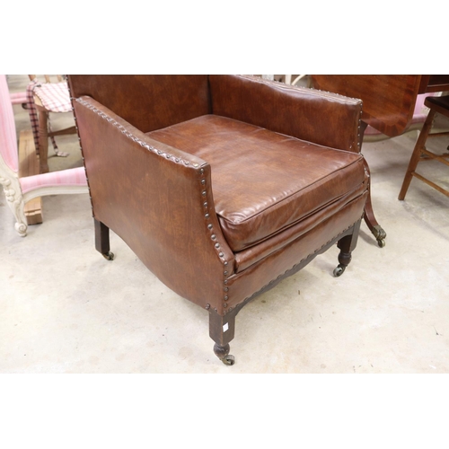 586 - Vintage faux brown leather studded trim arm chair
