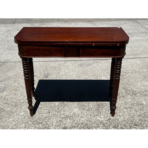 652 - Antique late Regency mahogany fold over tea table, standing on multi ring turned legs, approx 76cm H... 