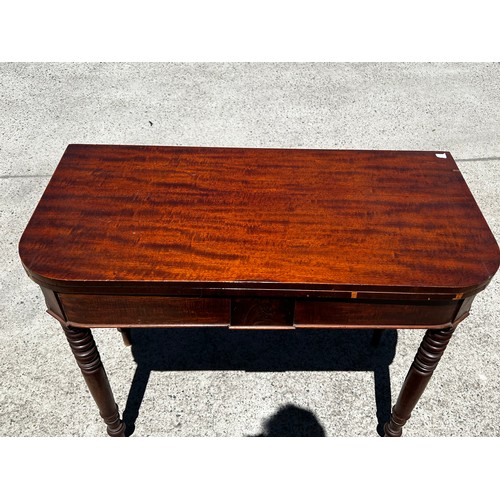 652 - Antique late Regency mahogany fold over tea table, standing on multi ring turned legs, approx 76cm H... 