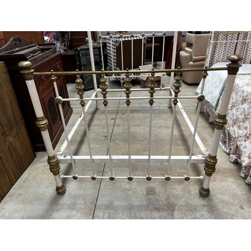 670 - Antique brass and iron double bed with spring base, including valance and quilt, approx 146cm H x 21... 