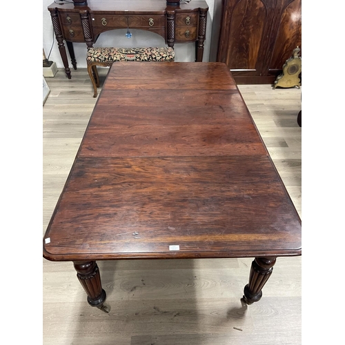 695 - Antique Victorian mahogany extension dining table, single large extra leaf standing on turned fluted... 