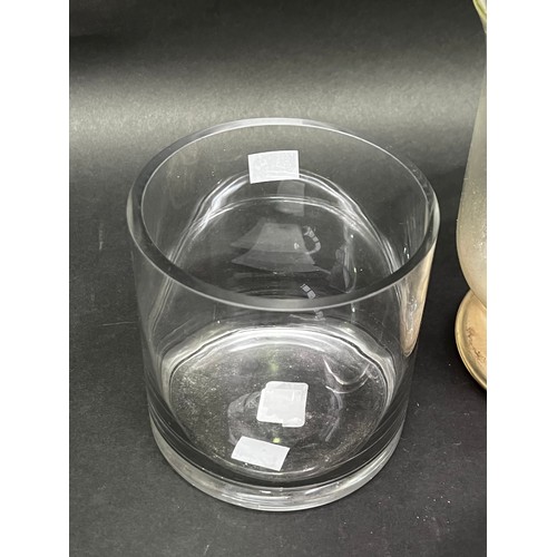 719 - Glass lolly jar, cover, candle hold and a vase, approx 23cm H and shorter (4)