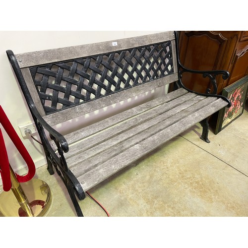 745 - Cast iron end wooden slat garden bench, approx 127 cm long